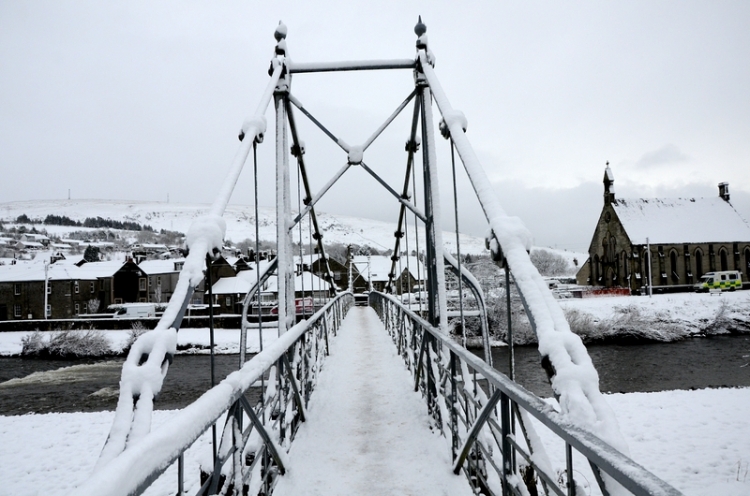 sSuspension bridge in snow